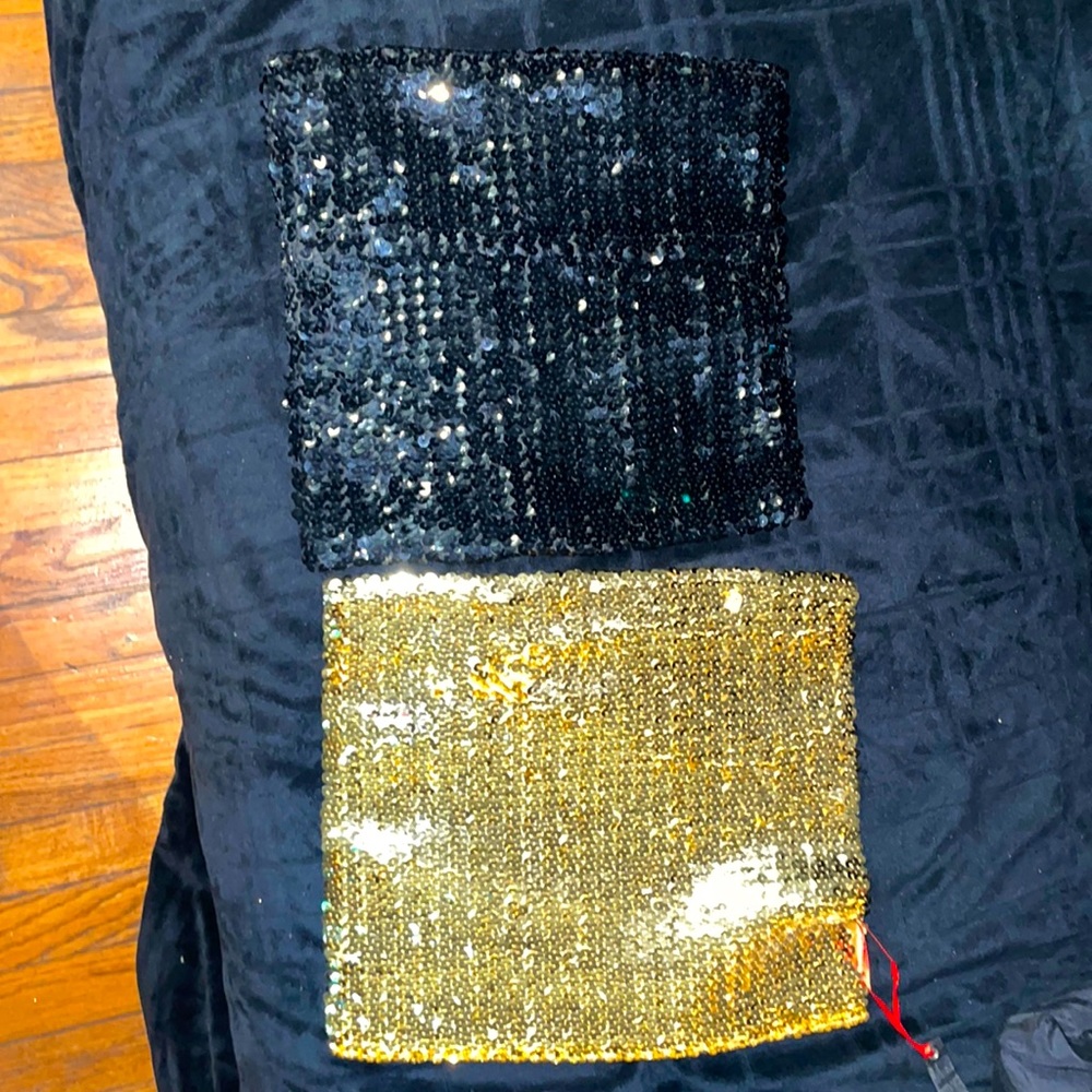 One black and one gold sequence tube tops